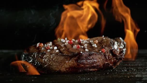 Close-up of falling tasty beef steak, slow motion. — Stock Video