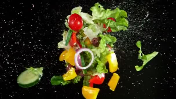 Super Slow Motion Shot of Flying Fresh Salad at 1000 fps. — стоковое видео