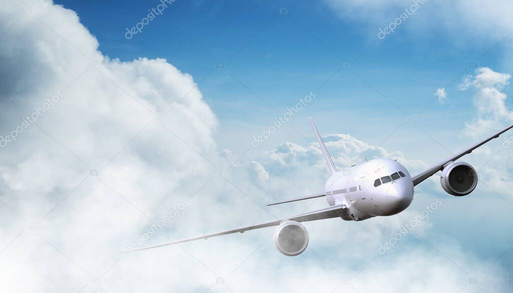 Commercial airplane jetliner flying above dramatic clouds.