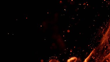 fire flames with sparks on black background clipart