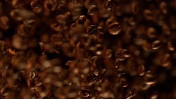 Super slow motion of flying coffee beans. — Stock Video