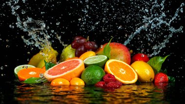Freeze Motion Shot of Fresh Fruits with Splashing Water clipart