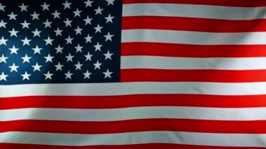 American Flag Waving 'e yakın çekim. ABD Bayrağı Rüzgarda Çırpınıyor.
