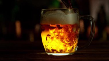 Super Slow Motion of Pouring Beer into Pint Glass, Camera Move. Filmed on High Speed Cinema Camera, 1000 fps.