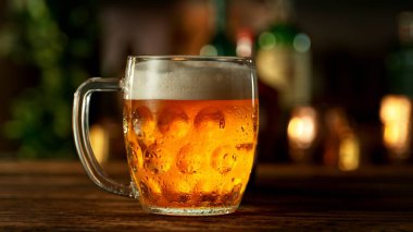 Pouring Beer into Pint Glass in a Pub, Close-up