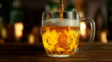 Pouring Beer into Pint Glass in a Pub, Close-up