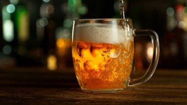 Pouring Beer into Pint Glass in a Pub, Close-up
