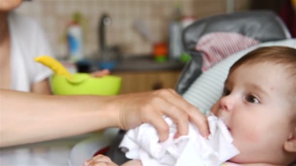 Mother Feeding Breakfast Her Daughter Kitchen Background Slow Motion Effect — Stock Video