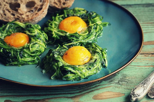 depositphotos_281471526-stock-photo-fried-egg-in-zucchini-noodle.jpg