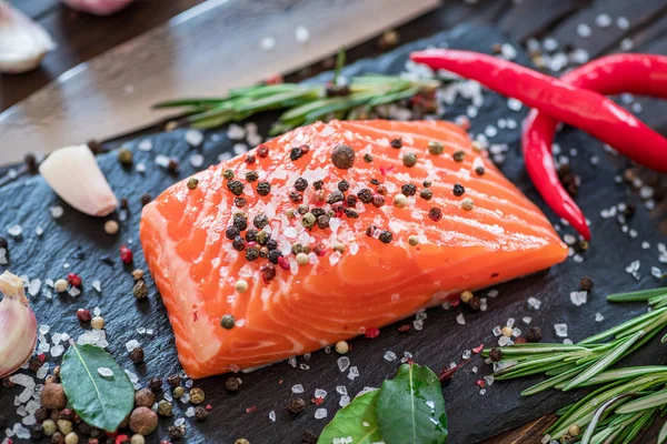 Fresh Salmon Fillets Black Cutting Board Herbs Spices — Stock Photo, Image