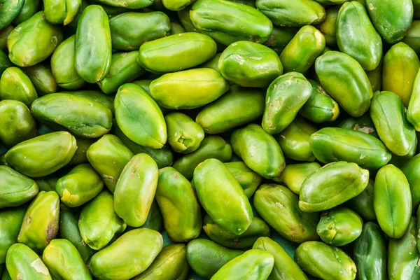 Viele Grüne Pistazienkerne Lebensmittel Hintergrund — Stockfoto