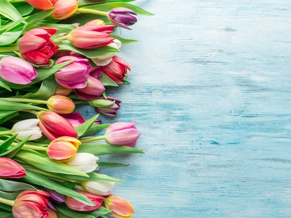 Colorful Bouquet Tulips Blue Wooden Background Top View — Stock Photo, Image