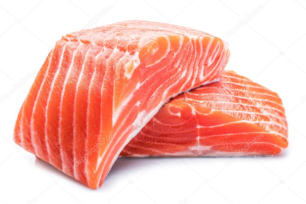 Fresh raw salmon fillets isolated on white background.