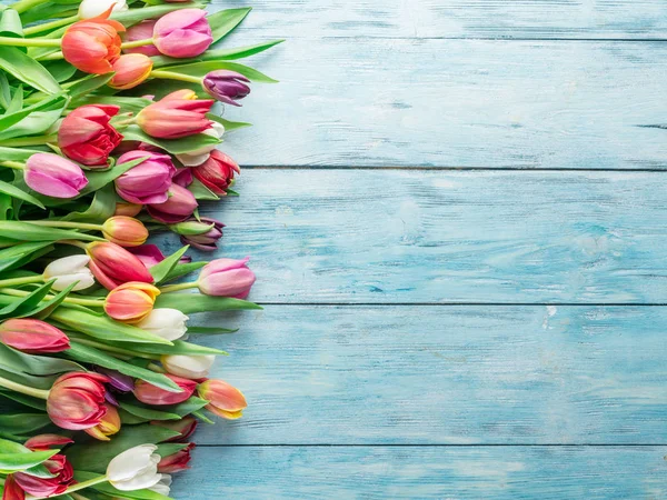 Colorful Bouquet Tulips Blue Wooden Background Top View — Stock Photo, Image