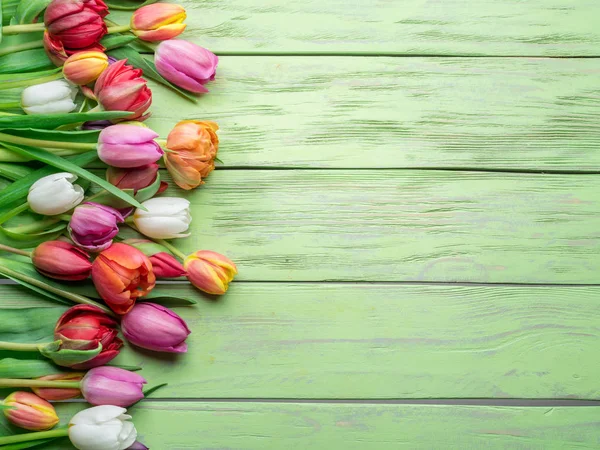 Colorful Bouquet Tulips Green Wooden Background Top View — Stock Photo, Image