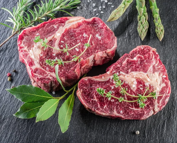 Rib Eye Steaks Spices Black Background — Stock Photo, Image