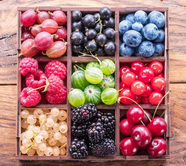 Colorful Berries Wooden Box Table Top View — Stock Photo, Image