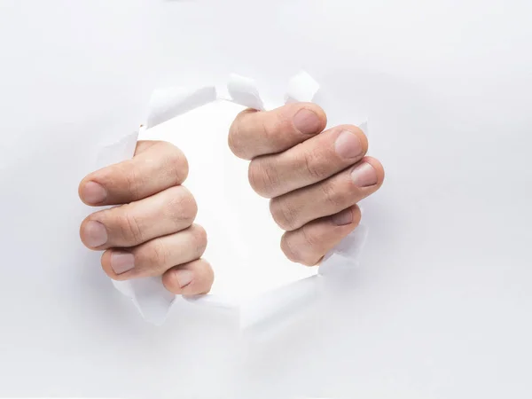 Mãos Homem Rasgando Buraco Papel — Fotografia de Stock