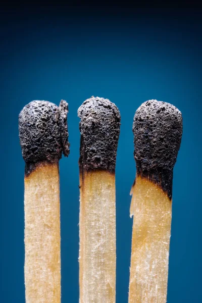 Burnt Out Safety Matches Blue Background — Stock Photo, Image