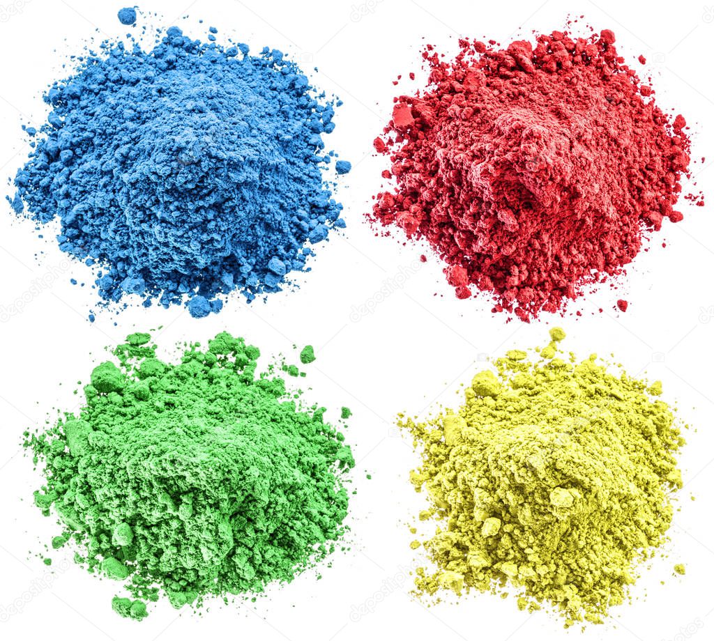 Colorful powders on the white background.