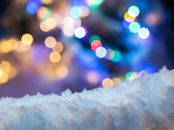 Nieve Esponjosa Primer Plano Borrosa Brillante Luz Navidad Fondo — Foto de Stock