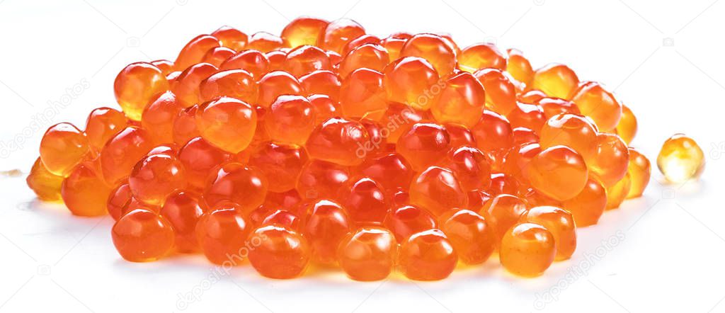 Red caviar on white background. Macro picture.
