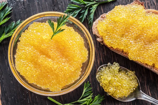 Pike caviar or roe in the bowl on wooden background. Top view. — Stock Image Pike Caviar Roe Bowl Wooden Background Top View Royalty Free Stock Images