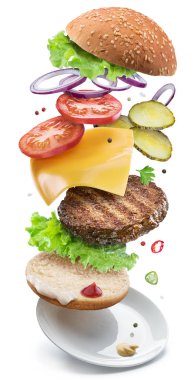 Tek bir mükemmelsin oluşturmak için bir düşen hamburger malzemeler