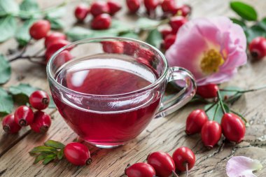 Rose-kalça ve kuşburnu çekirdeği yağı ahşap tablo.