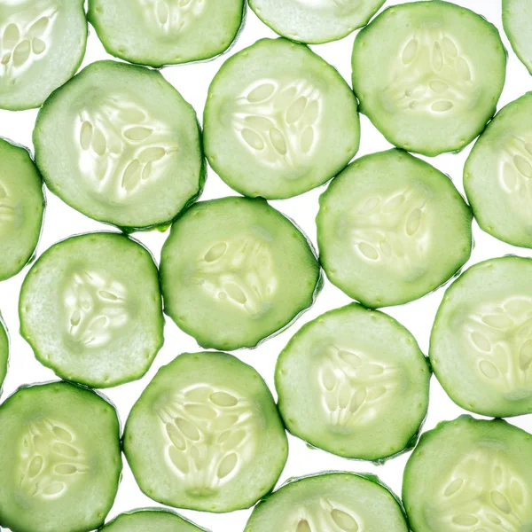 Cucumber slices isolated on the white background. — Stock Photo, Image