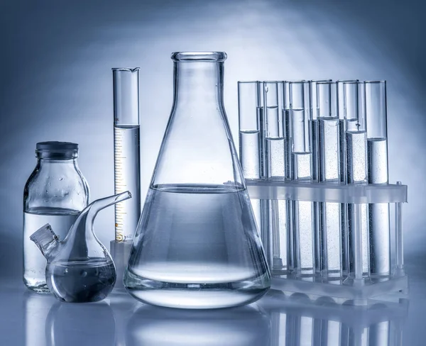 Different laboratory beakers and glassware. — Stock Photo, Image