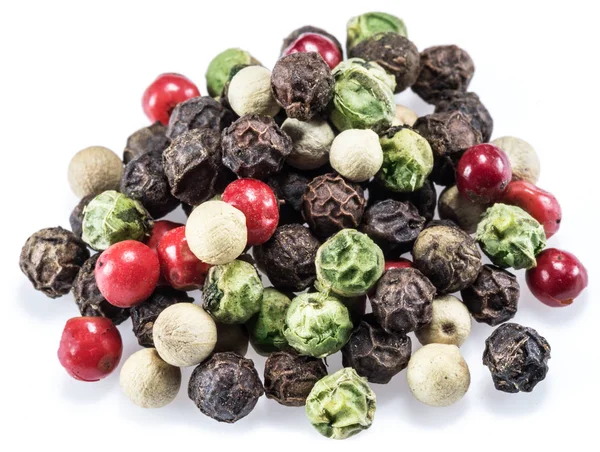 Black, white, green and red peppercorns isolated on white backgr — Stock Photo, Image