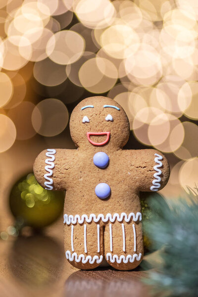 Gingerbread man on a Christmas background. 