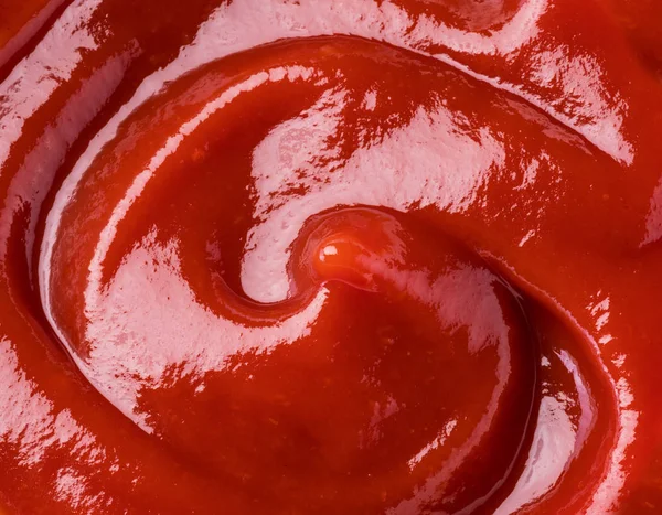 Ketchup eller tomatsås pöl. Närbild. — Stockfoto