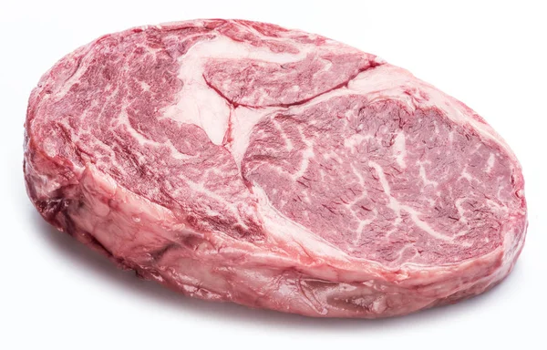 Surový Ribeye steak nebo hovězí steak izolovaný na bílém pozadí. — Stock fotografie