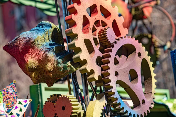 Machine rotary mechanism with colored gears