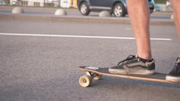 Closeup of Skateboarder Riding in Street — Stock Video