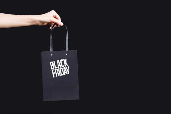 Crop View of Woman Hand Holding Black Friday Shopping Bag — Stok Foto