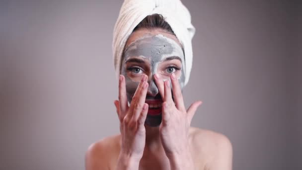 Portrait of Woman Touching Her Face in Clay — Stock Video