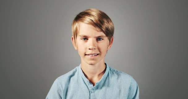 Smiling Boy Isolated On Grey Portrait — Stock Video