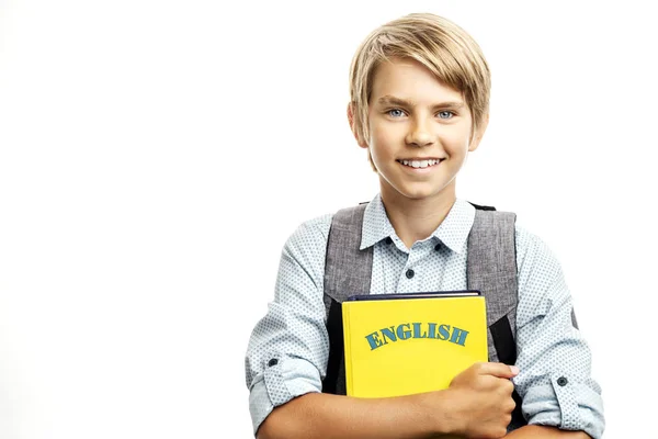 Kid Holding engelska läroböcker — Stockfoto