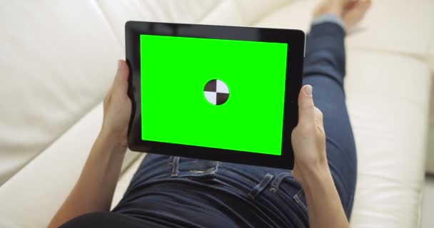 Woman with Tablet Chromakey Lying on Sofa — Stock Video