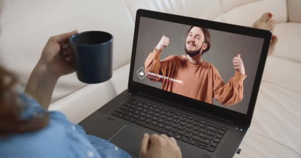 Watching Video Blog on Laptop — Stock Video