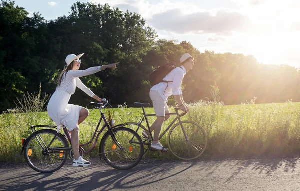 Young Enthusiastic Cyclist Couple Trip