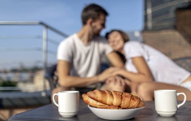 Morning Coffee and Croissants for Loving Couple clipart