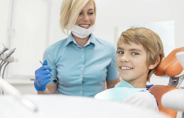 Young Smiling Sitting in a Dental Chair — 图库照片