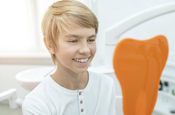 Contented Boy After Visit to the Dentist