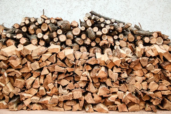 Background of the wall of chopped firewoods — Stock Photo, Image