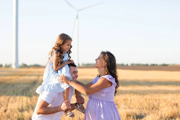 Happy Young Husband Pregnant Wife Little Girl Father Shoulders Field — Stock Photo, Image