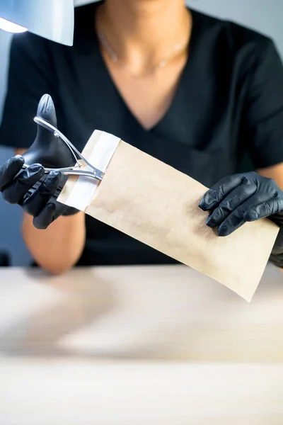 Manicure Master Puts Manicure Tool Paper Heat Dry Bag Sterilization — Stock Photo, Image